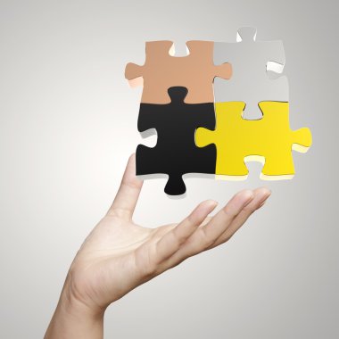 3D puzzle kavram olarak gösterilen el 