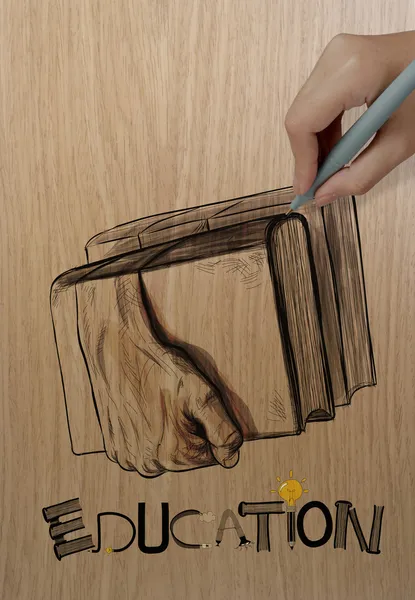 Ręka z książek na tle drewna jako crea trzymając się za ręce — Zdjęcie stockowe