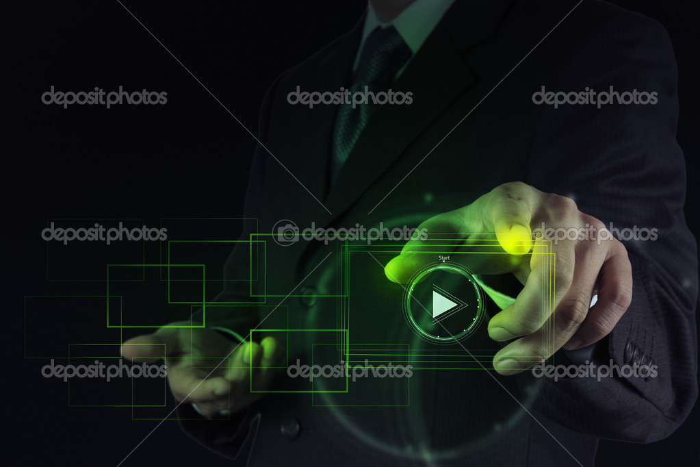 Hand press play button sign to start or initiate projects as con ...