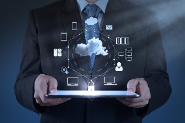 Businessman working with a Cloud Computing diagram on the new co clipart