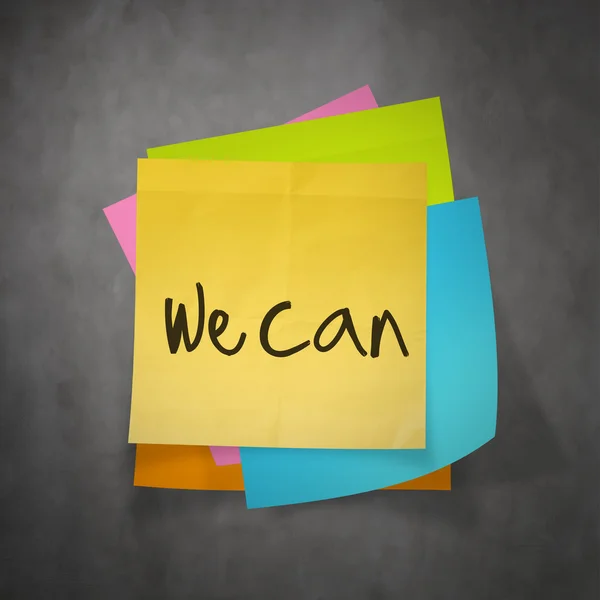 "we can "text on sticky note paper on wall texture — стоковое фото