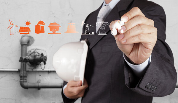  engineer shows oil and gas refinery, pipelines and towers, heav