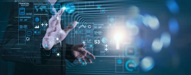 Ticari işlemler bilançosu ve gelir tablosu ile ilgili mali rapor verileri ve diyagramı geleceğin kavramı olarak gösterir.İş adamı eli modern yenilikçi bilgisayar dasboard 'u.