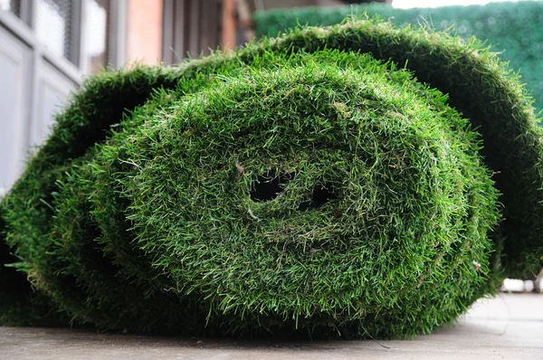 Old grass mat rolling prepare to proceed. — Stock Photo, Image