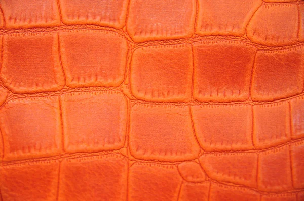 橙色的泡沫皮肤鳄鱼打印. — 图库照片