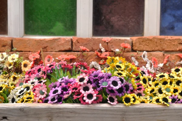 Colorful plastic flowers — Stock Photo, Image