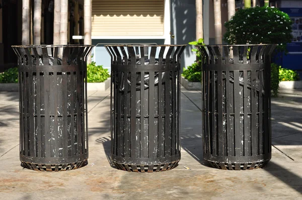 Three black iron bins — Stock Photo, Image