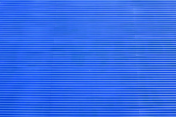 Μπλε φόντο με σχέδιο ρίγες — Φωτογραφία Αρχείου