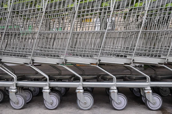 Row of empty shopping carts — Stock Photo, Image