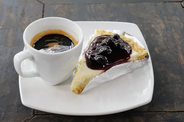 Piece of cake with espresso shot — Stock Photo, Image