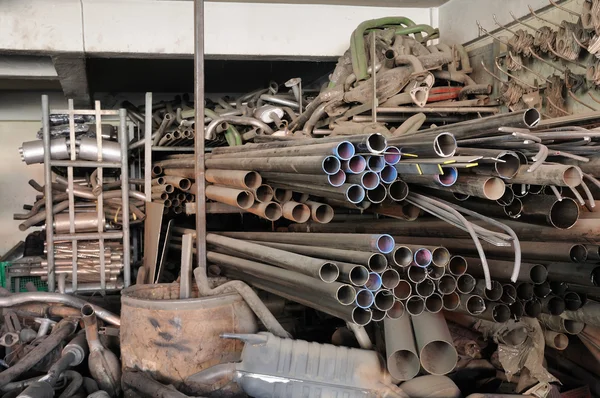 Stack of iron pipes, spar parts. — Stock Photo, Image