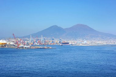                                View to Naples cargo port and volcano Vesuvius, Italy