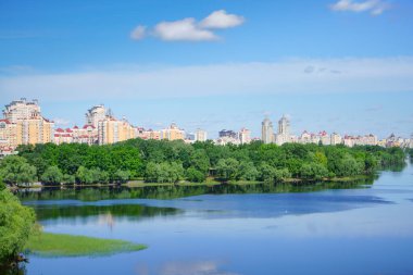                                                 View at residential district Obolon on the bank of Dnieper river at sunny summer day, Kyiv, Ukraine.