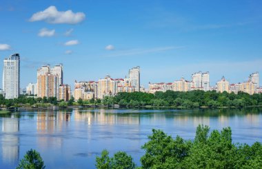                   View at residential district Obolon on the bank of Dnieper river at sunny summer day. Kyiv, Ukraine.