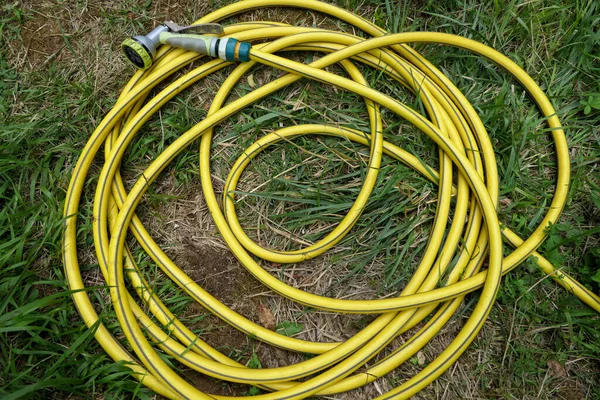 Coil Yellow Hosepipe Sprayer Attached Laid Ground Watering — Stock Photo, Image