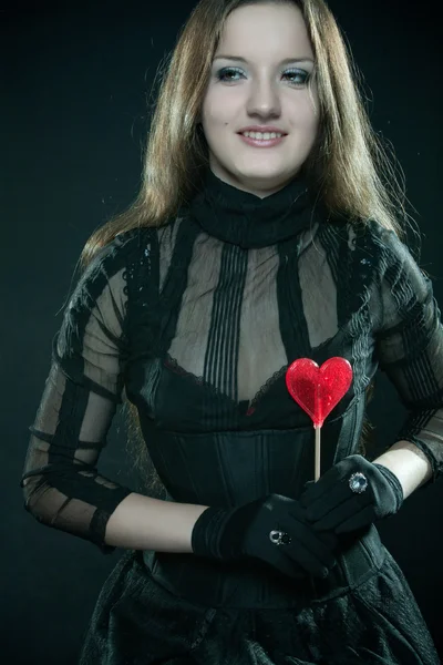 Gothic girl with lollipop — Stock Photo, Image