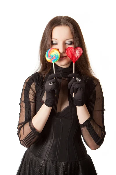 Gothic girl with two lollipops — Stock Photo, Image