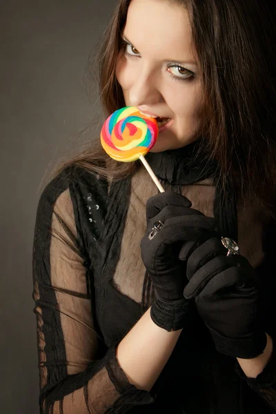 Gothic girl with lollipop — Stock Photo, Image