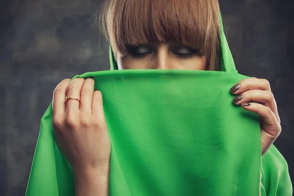 Woman with covered face — Stock Photo, Image