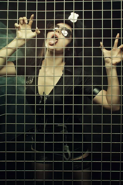 Captured seductive police woman — Stock Photo, Image