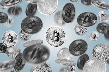 Gri arkaplan üzerine düşen bitcoinler