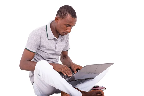 Serious Young Man Using Laptop Computer Sitting Floor — Stock Photo, Image