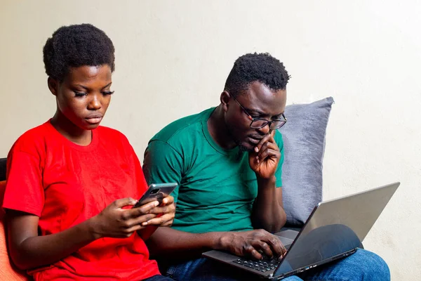 Young Couple Sitting Together Sofa Home Man Using Laptop While — Stock Photo, Image