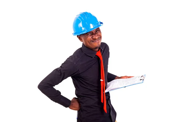 Jovem Engenheiro Vestindo Capacete Segurança Azul Segurando Prancheta Sofrendo Dor — Fotografia de Stock