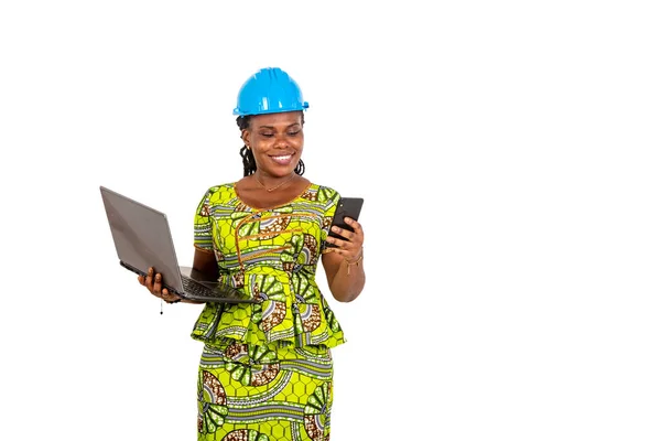 Beautiful Young Female Engineer Wearing Hard Hat Holding Laptop Computer — Fotografia de Stock