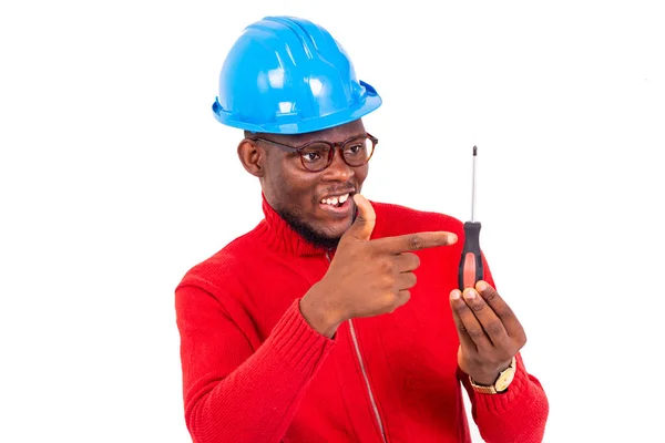 Jovem Engenheiro Construção Masculino Vestindo Chapéu Azul Duro Apontando Dedo — Fotografia de Stock