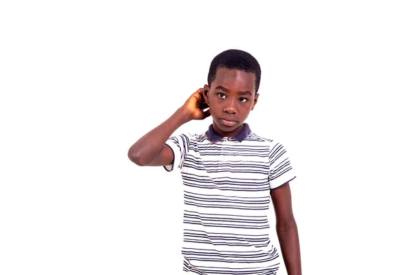 Young Boy Tee Shirt Standing White Background Looking Away While — Stock Photo, Image