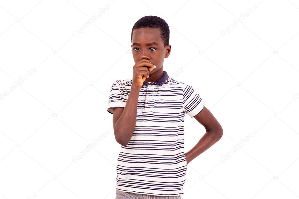 Thinking teenager focused on doubt with hand over mouth and looking up kissed eyes to camera.