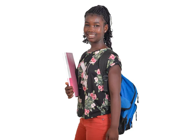 花のタンクの上に立つ若い女子学生白い背景の上にバックパックを身に着けているとカメラを見て陽気にノートを保持笑顔 — ストック写真