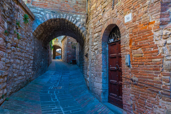 Narrow street in the old town of Gubbio in Italy.