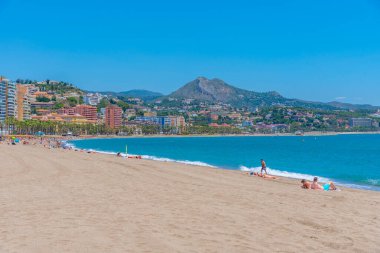 Malaga, İspanya, 24 Mayıs 2021: İnsanlar Malaga, İspanya 'da güneşli bir günün tadını çıkarıyorlar