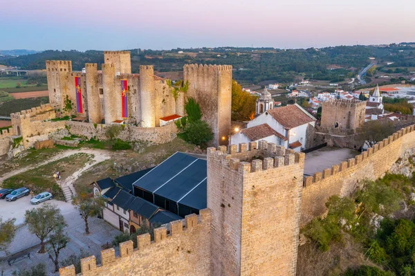 Portekiz 'deki Obidos şatosunun gün batımı manzarası.