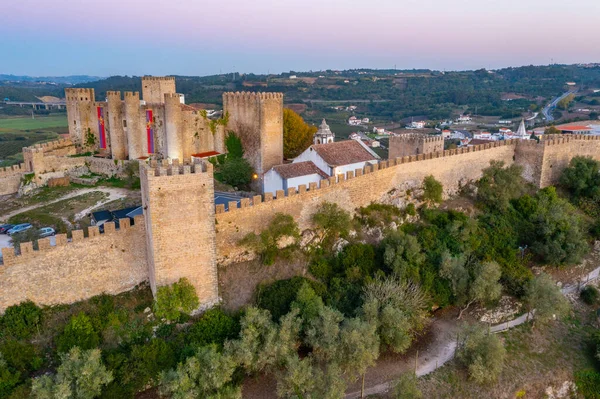 Portekiz 'deki Obidos şatosunun gün batımı manzarası.