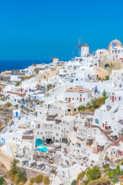 Yunanistan 'ın Santorini adasındaki Oia köyü üzerinde popüler manzara