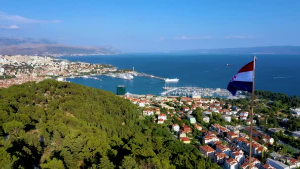 "Croatian flag waving at Marjan hill with Split in Background — Stockvideo