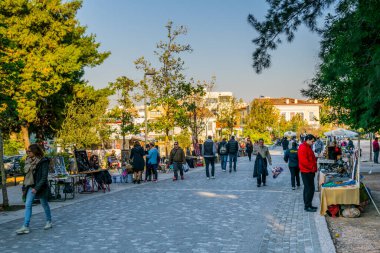 ATHENS, GREECE, DECEMBER 10, 2015: people are walking on a steep wide path leading to the akroplos complex in athens, greece
