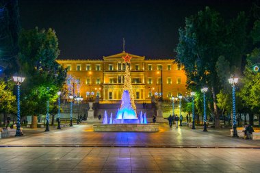 ATHENS, GREECE, DECEMBER 10, 2015: Syntagma square with parliament building at the end in Athens decorated for Christmas