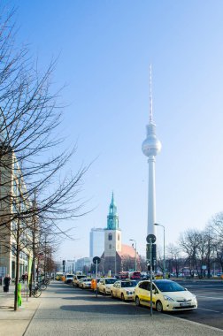 BERLIN, GERMANY, MARCH 12, 2015:detail of saint marienkirche with fernsehturm - tv tower in berlin.