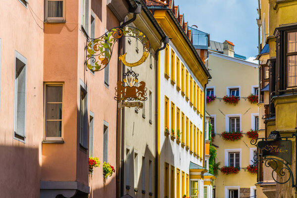 HALL IN TIROL, AUSTRIA, JULY 27, 2016: Colorful facades of houses in the Austrian city Hall in Tirol.