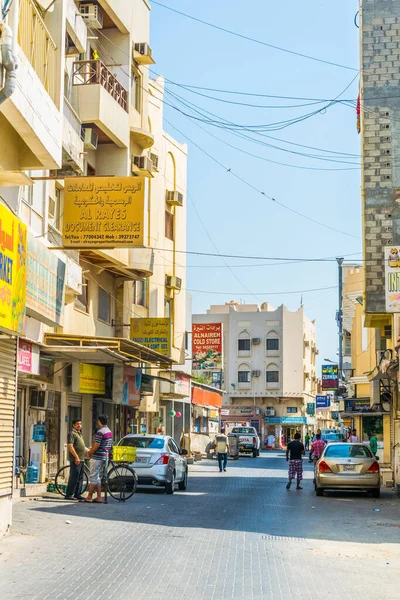 AL MUHARRAQ, BAHRAIN, OCTOBER 23, 2016: View of a shopping street on the Al Muharraq island in Bahrain