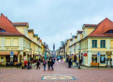 POTSDAM, GERMANY, MARCH 11, 2015: small square near potsdam where brandenburger strasse reaches famous brandenburger tor.