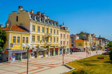 SHUMEN, BULGARIA, AUGUST 3, 2014: People are walking on the main boulevard in the Bulgarian city Shumen