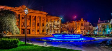 RUSE, BULGARIA, MARCH 25, 2015: night view of the illuminated building of justice in bulgarian city rousse - ruse.