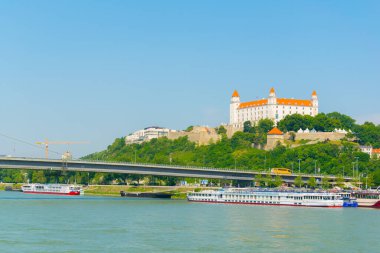 BRATISLAVA, SLOVAKIA, MAY 28, 2016: View of the cathedral of saint martin and Bratislava Castle over danube river in Slovakia