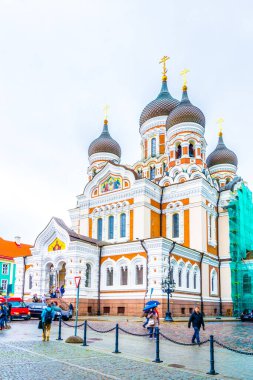 TALLIN, ESTONIA, AUGUST 16, 2016: People are walking in front of the Alexander Nevski Russian Orthodox Cathedral in Toompea part of Tallin, Estonia