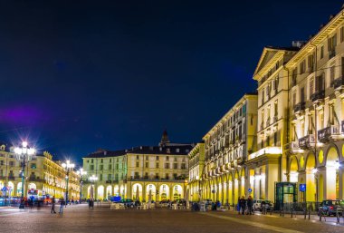 TORINO, ITALY, MARCH 12, 2016: night view of the main square of the italian city torino - piazza vittorio veneto.